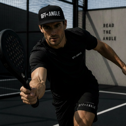 OFF<ANGLE Baseline Snapback Black premium flat brim padel cap with minimalist monochrome streetwear design