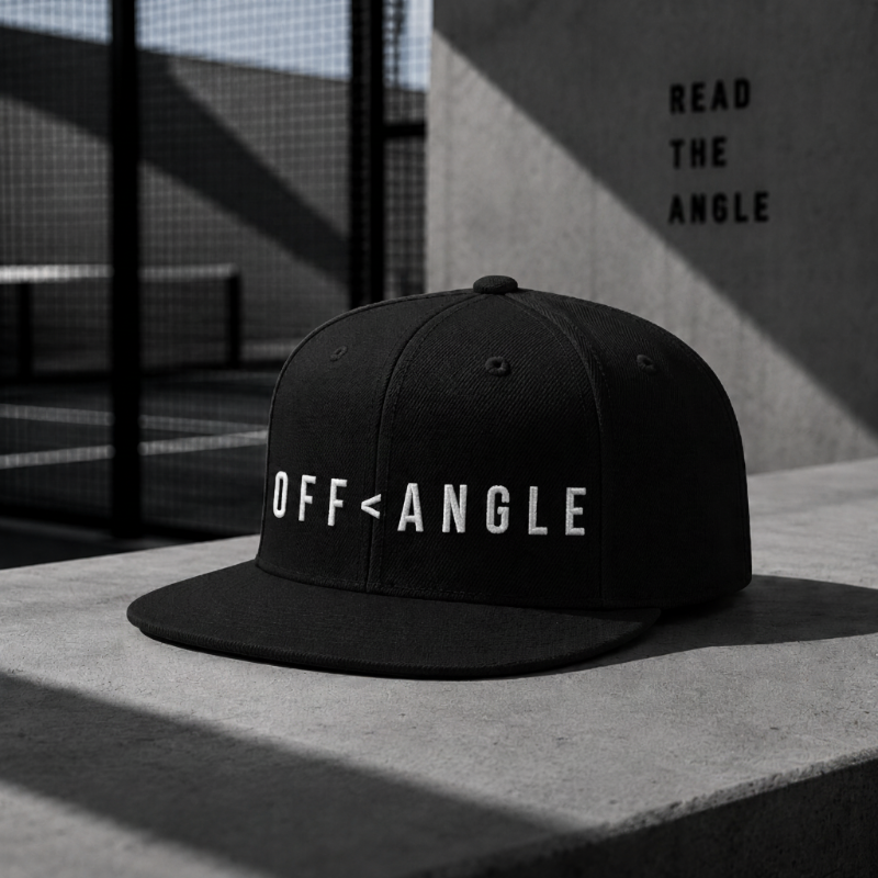 OFF<ANGLE Baseline Snapback Black premium flat brim padel cap with minimalist monochrome streetwear design