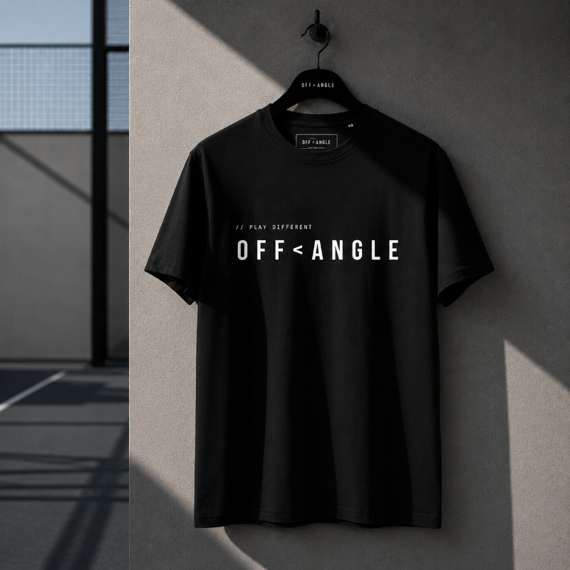 OFF<ANGLE Baseline Tee Black premium organic cotton padel t-shirt in minimalist monochrome editorial sportswear style