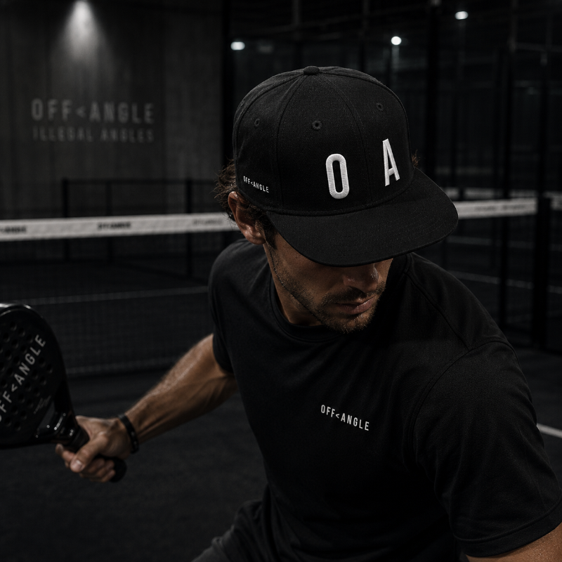 OFF<ANGLE Out Of Position Cap Black premium snapback cap from the ILLEGAL ANGLES collection with oversized white O A front embroidery