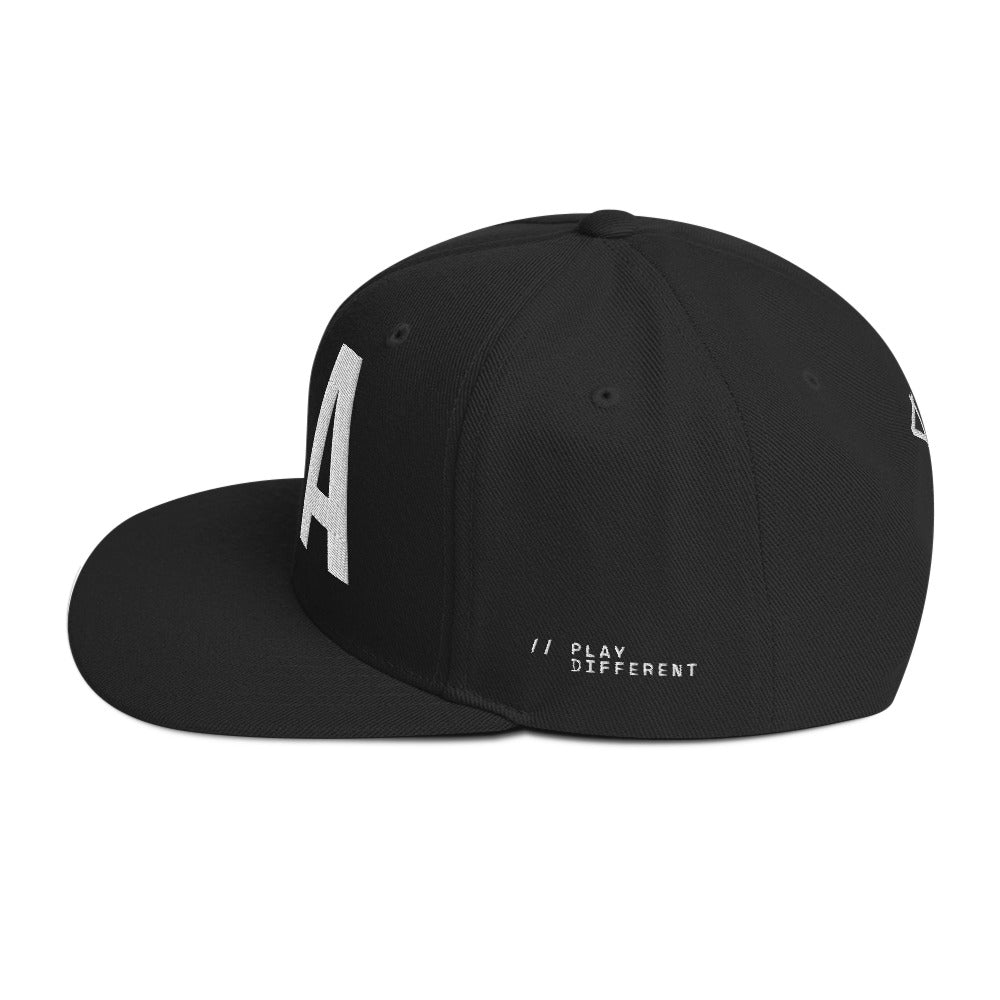 OFF<ANGLE Out Of Position Cap Black premium snapback cap from the ILLEGAL ANGLES collection with oversized white O A front embroidery